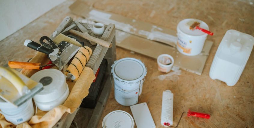 Overhead shot of tools and paint supplies for a home renovation project. — Antivirus Review -- What Is It?