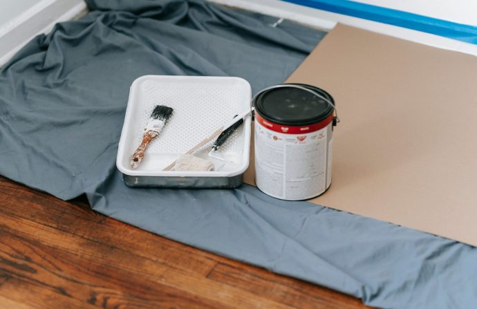A collection of painting tools and materials prepared for a home renovation project indoors. — DocSend Data Space Comprehensi