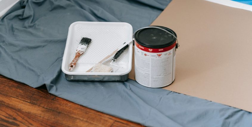 A collection of painting tools and materials prepared for a home renovation project indoors. — DocSend Data Space Comprehensi