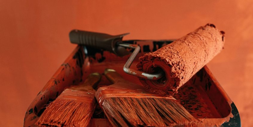 Orange paint tools in a messy tray, perfect for renovation themes. — Info Rooms Contrast - What you should expect in a Info R