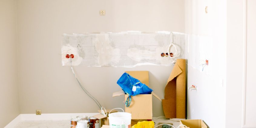 A room undergoing renovation with tools, supplies, wiring — Malware For Home windows
