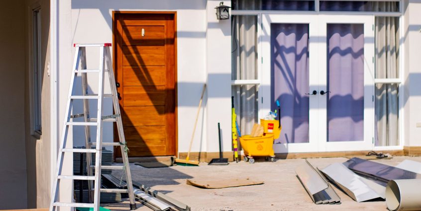 Front entrance of a house under renovation with tools and materials scattered around. — Methods to Secure Your Files With Onl