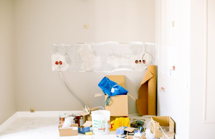 A room undergoing renovation with tools, supplies, wiring — Online Dating Etiquette