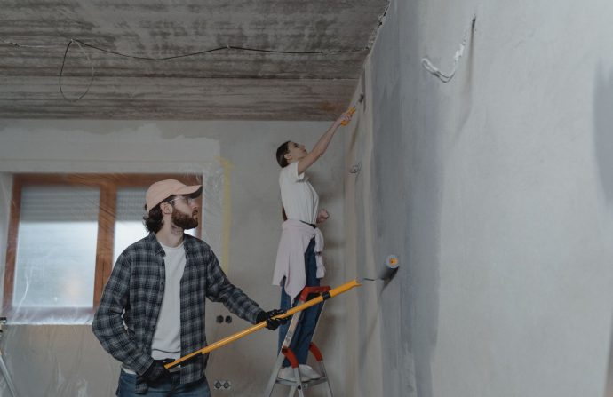 A couple painting a room together, highlighting teamwork in home renovation. — Where to get a VDR for International
